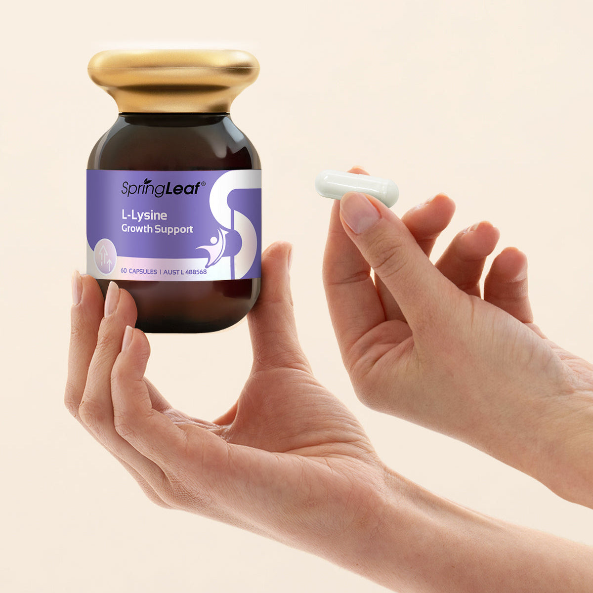 Spring Leaf L-Lysine supplement bottle held by a hand with a plain background